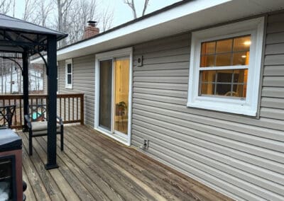 Home With Deck And Sliding Glass Door